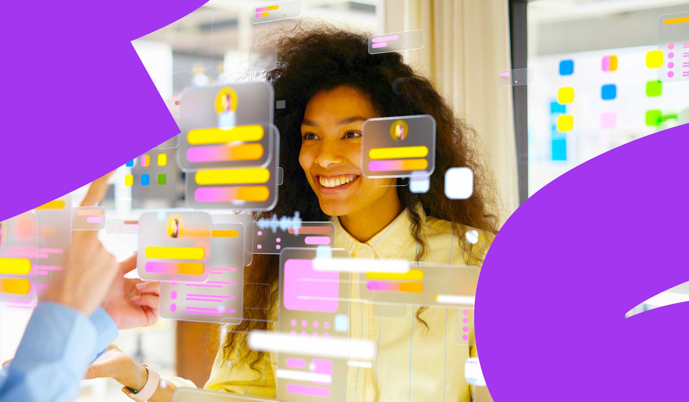 Female Gen Z employee sitting at her desk smiling surrounded by graphics and web elements